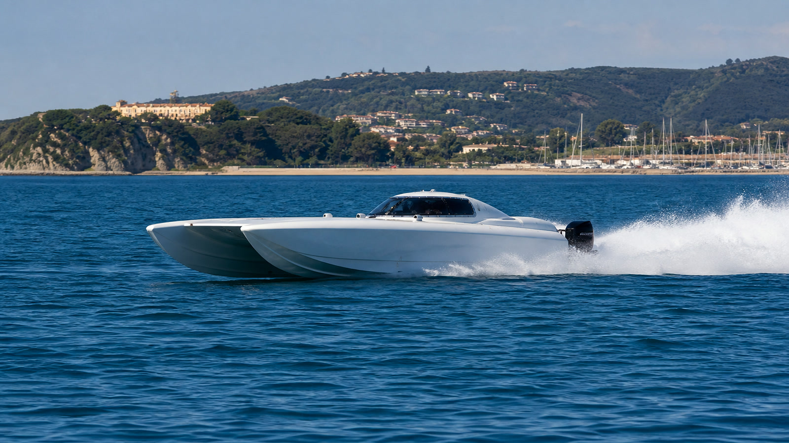 Offshore powerboat racing on Mediterranean water near the Italian coast